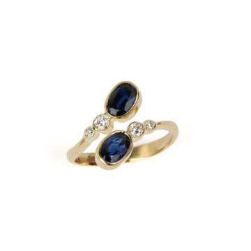 Featured image of this Women’s 18k Yellow Gold Diamond, Sapphire Crossover Ring